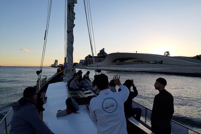 2-Hour Lisbon Traditional Boats Sunset Cruise with White Wine - The 25 de Abril Bridge moment: why that color and scale feels bigger at sunset