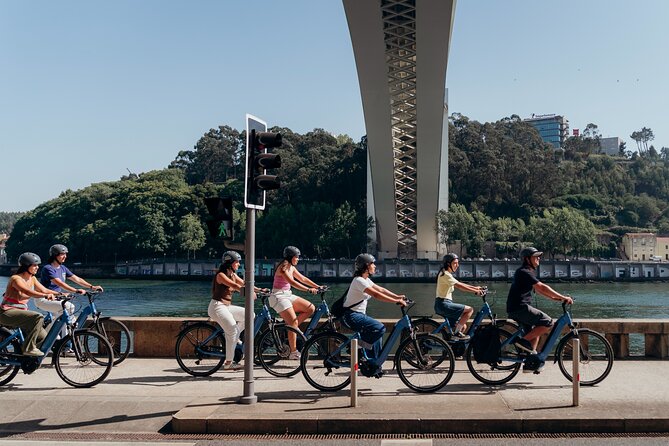 3-Hour Porto Highlights on a Electric Bike Guided Tour - Sao Bento station tiles and Porto Cathedral in the final stretch
