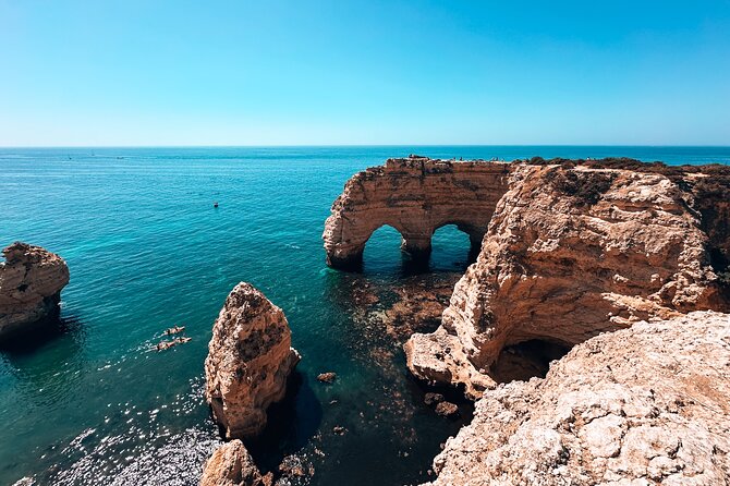 Albufeira: Benagil, Algar Seco, Marinha & 7 Hanging Valleys Tour - Algar Seco’s Caves, the Window to the Sea, and Optional Cliff Jumps