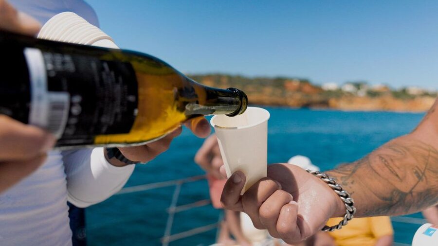 Albufeira: Caves and Coastline Catamaran Cruise to Benagil - Onboard perks: Wi-Fi, music, snacks, and the champagne finish