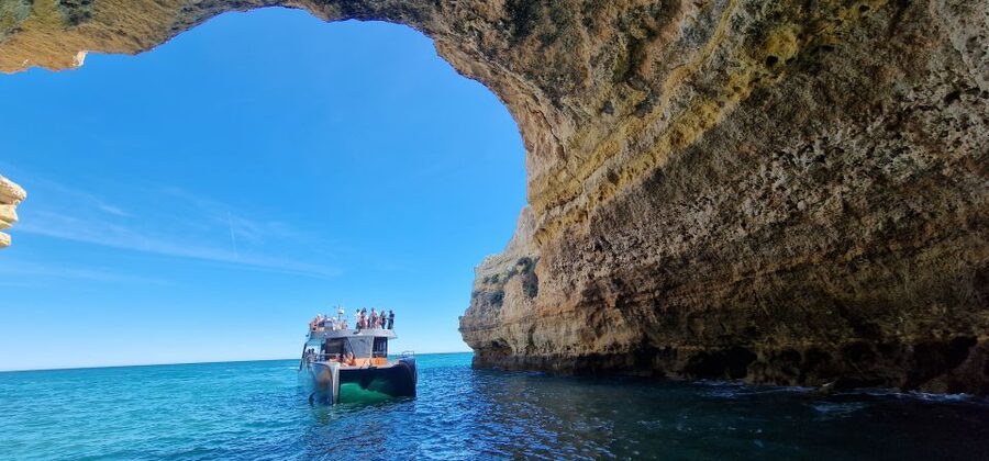 Albufeira: Coastline and Benagil Caves Tour by Catamaran - Meet at Albufeira Marina, then settle into the ride