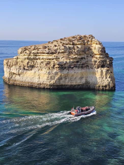 Albufeira: Dolphin Watching and Benagil Cave Boat Cruise - The boat experience: fast, small, and intentionally close to the coast