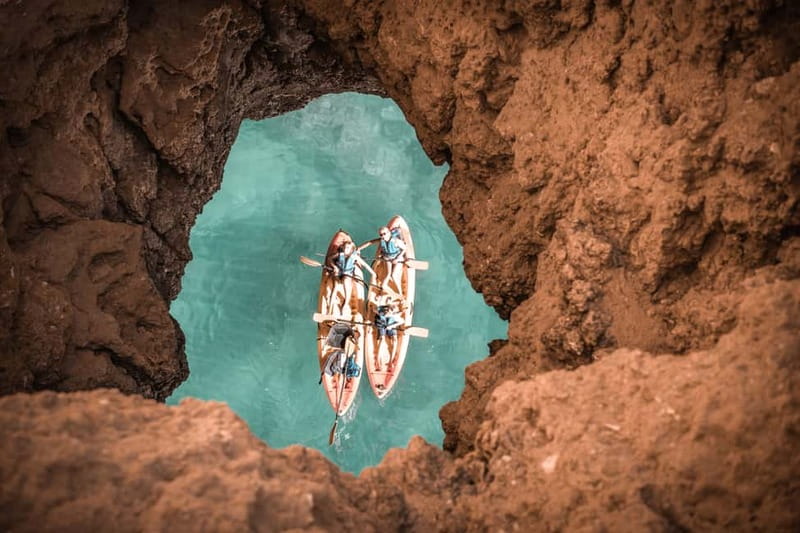 Albufeira: Hidden Beaches & Cliffs Guided Kayak Cave Tour - Paddle time at Praia da Coelha and the coastline “texture test”