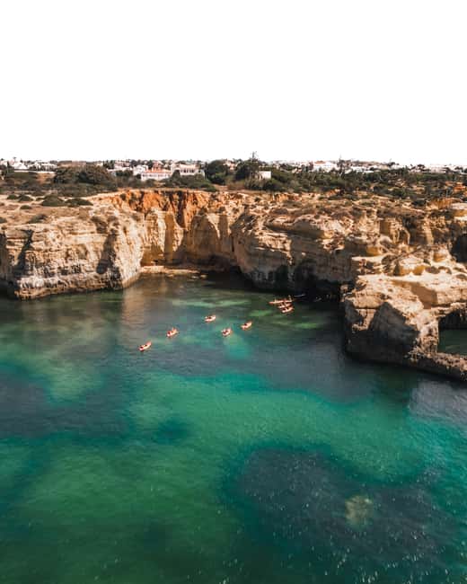 Albufeira: Secret Caves & Beaches Kayak Tour with Swim Stop - Praia da Coelha sightseeing: another paddle segment with time to look around