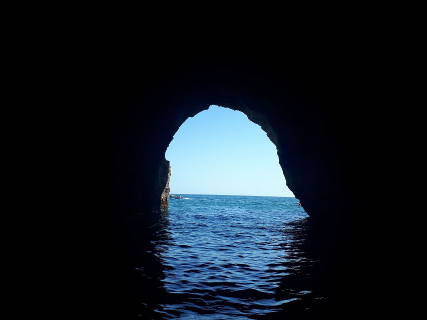 Algarve: Boat Trip to the Caves of Benagil - Entering Benagil and the nearby cave interiors for photos