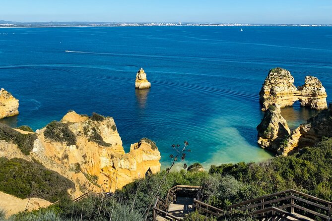 Algarve: Lagos Sightseeing guided Tour with e-bikes - Ponta da Piedade cave area and lighthouse views you can actually reach