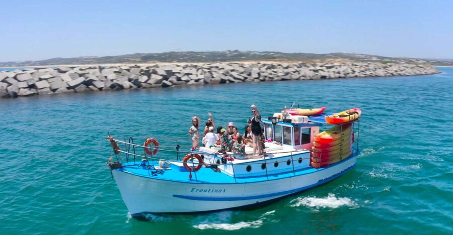 Alvor: Explore Caves Boat and Kayak Tour - The 1-Hour Boat Cruise Out: Stories, Shore Views, and Calm Control