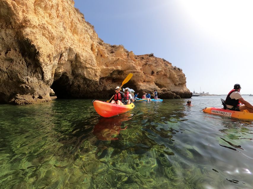 Alvor: Explore Caves Boat and Kayak Tour - The Swim and Deck Time: Refreshing Water, Drinks, and a Low-Key Finish