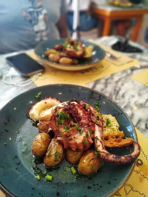An Epic Sintra Tour - Regaleira Palace | Cabo da Roca & More - Snacks and Portuguese liquor tastings on the van
