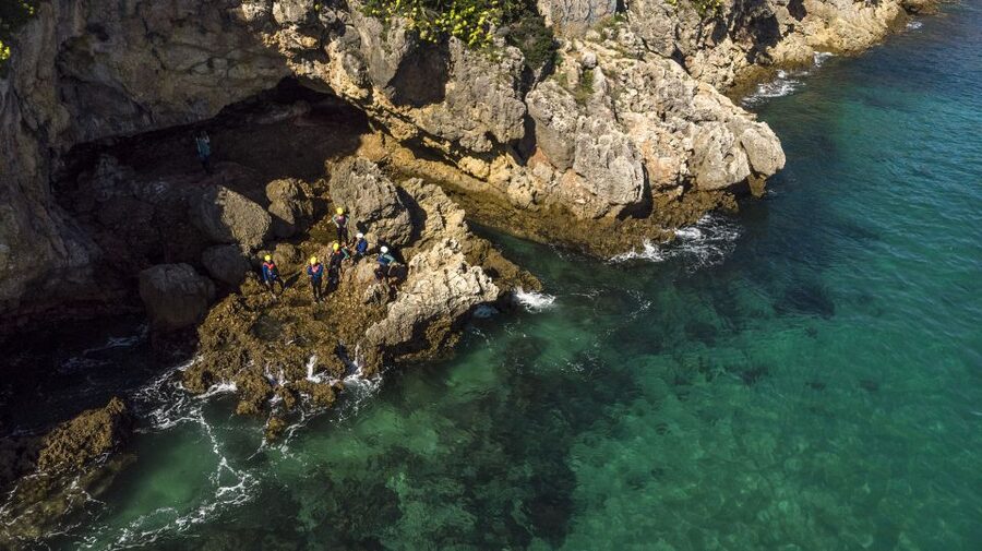 Arrábida: Setubal, Sesimbra Coasteering & Speedboat Tour - Caves, secret beaches, and why intertidal timing is part of the game