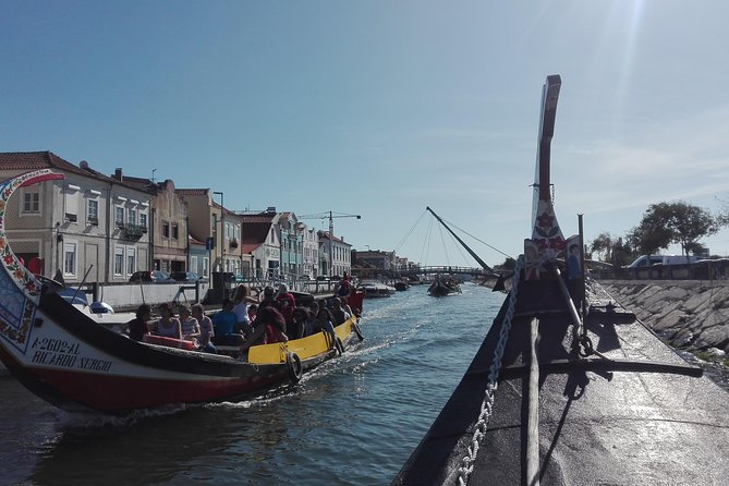 Aveiro, Costa Nova beach and Moliceiro Boat, half-day from Coimbra - Praia da Barra: lighthouse views and a short beach reset