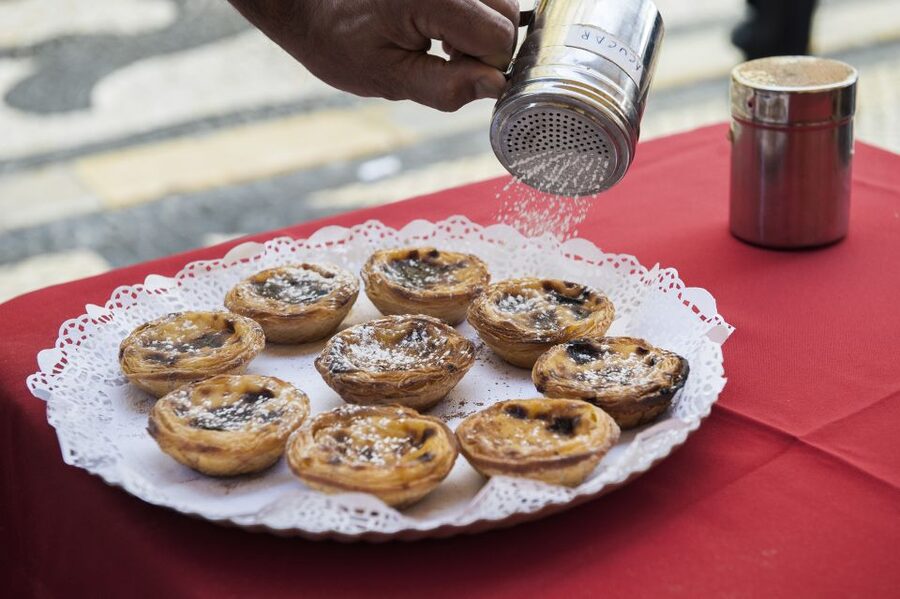 Best of Lisbon Walking Tour: Rossio, Chiado & Alfama - Chiado stroll: old cafes, boutiques, and bookish streets