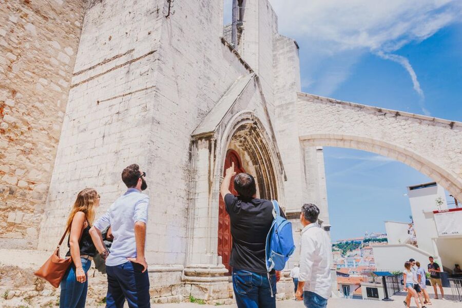 Best of Lisbon Walking Tour: Rossio, Chiado & Alfama - Start at Rossio Square and spot the neo-Manueline architecture