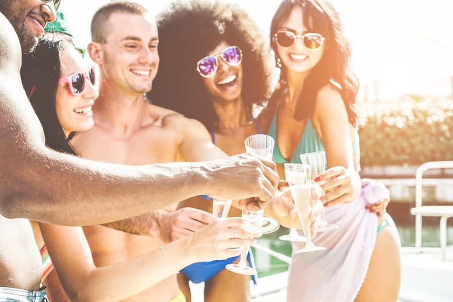 Boat Party to the Beach with Swimming Stops, DJ and Open Bar - Meeting Point in Praça do Comércio: Find the Clock and Check In