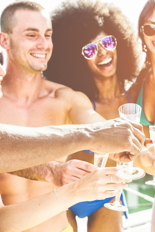 Boat Party to the Beach with Swimming Stops, DJ and Open Bar - Should You Book This Lisbon Party Cruise?