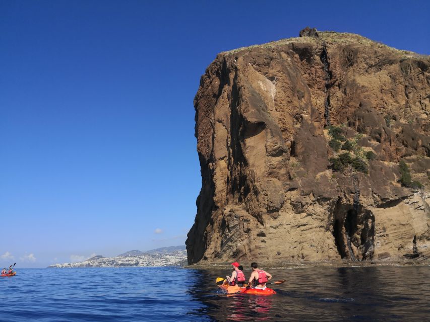 Caniço, Madeira: Marine Reserve Kayak & Snorkelling Tour - Paddling beneath the cliffs near Caniço: the view is the real reward