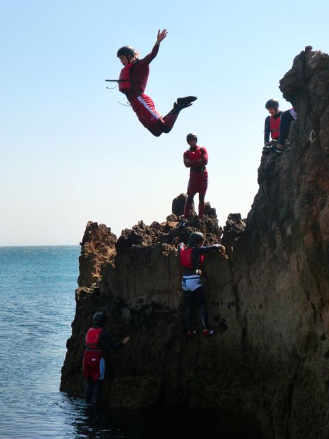 Coasteering Algarve: Cliff Jump, Swim & Climb in Sagres - Safety briefing, progressive jumps, and real choices