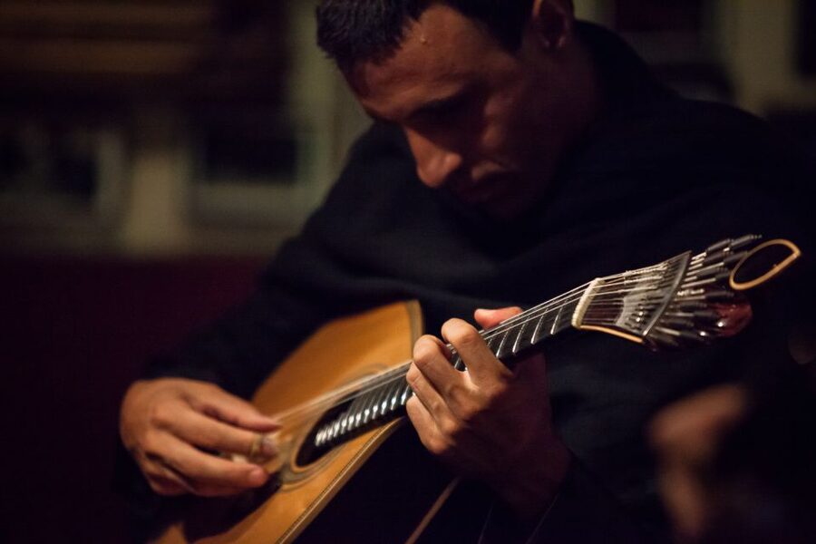 Coimbra: Live Fado Show with Glass of Port Wine - Casa Fado ao Centro: the cozy house-concert setup you actually feel