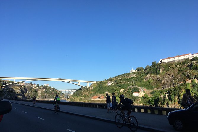 Experience Porto's Charm: 3-Hour Guided Walking Tour - Clerigos Tower and the Lello bookstore stairway effect
