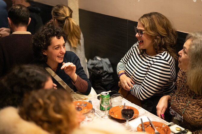Fado Musical Experience with Portuguese Wine & Appetizers - Finding the yellow umbrella near the Fado Museum