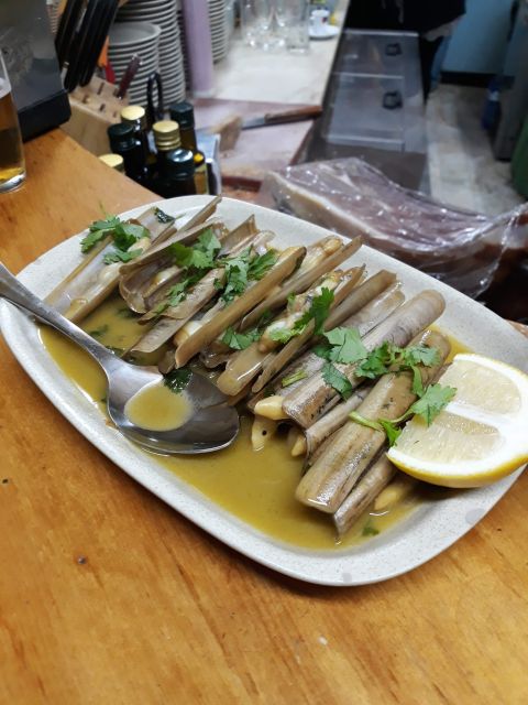 Faro: Old Town Guided Walking Food Tour - Wine, beer, and how the guide keeps it fun