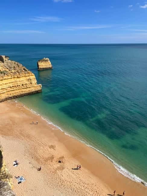 From Faro: Adventure Express Tour - Cliff Jump & Beach - The Meeting Point and Small-Group Vibe in Faro