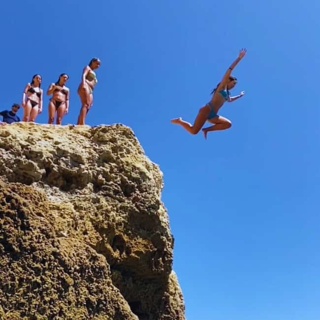 From Faro: Adventure Express Tour - Cliff Jump & Beach - Praia da Marinha: Guided Time, Free Swimming, and the Beach Reset