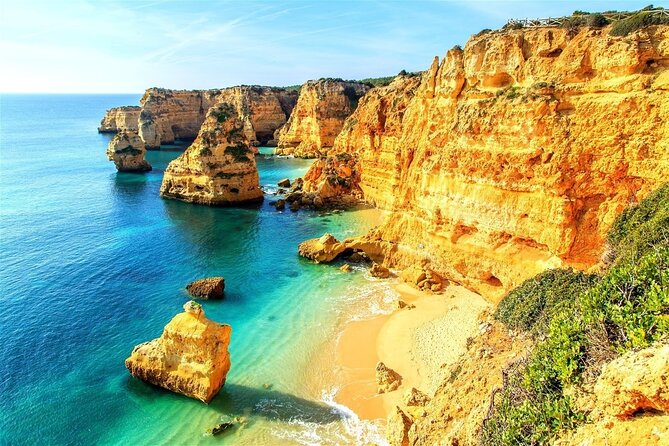 From Faro: Benagil Cave, Marinha & Carvoeiro Full-Day Tour - Praia da Marinha: the cliff trail that earns the photos