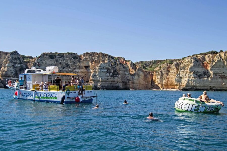 From Lagos: 2.5-Hour Guided Coastal Boat Tour & Grotto Visit - The Boat Setup: Shade, WC, Music, and Bar Service