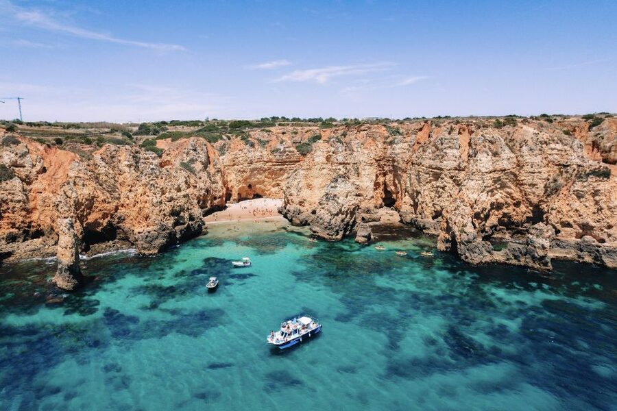 From Lagos: Kayak Experience in Ponta da Piedade - Your 2-hour rhythm: boat out, kayak through caves, then relax on board