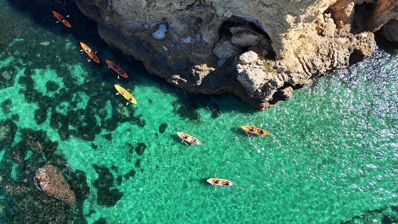 From Lagos: Ponta da Piedade Caves Kayak Tour from Catamaran - The Catamaran Swim Break and Onboard Slide: Cooling Off in Style