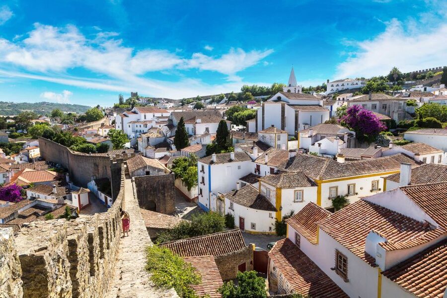 From Lisbon: Day Trip to Porto, Óbidos, and Nazaré - Óbidos Castle, Rua Dereita, and the Walls You Can Feel
