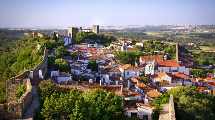From Lisbon: Fátima, Batalha, Nazaré & Óbidos Full-Day Tour - Nazaré Seaside, Fresh Fish Lunch, and a Miraculous 1182 Legend