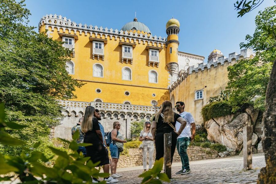 From Lisbon: Sintra & Cascais Group Tour with Pena Palace - Pena Palace and the forest climb that makes it look unreal