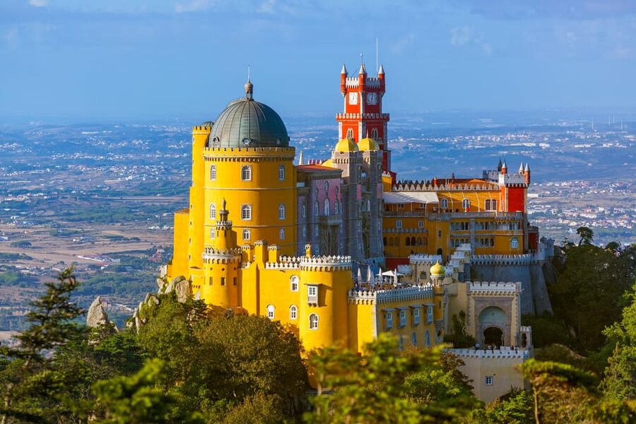 From Lisbon: Sintra, Pena Palace and Regaleira Day Trip - Quinta da Regaleira: Wells, tunnels, and a guided mystery you can actually follow