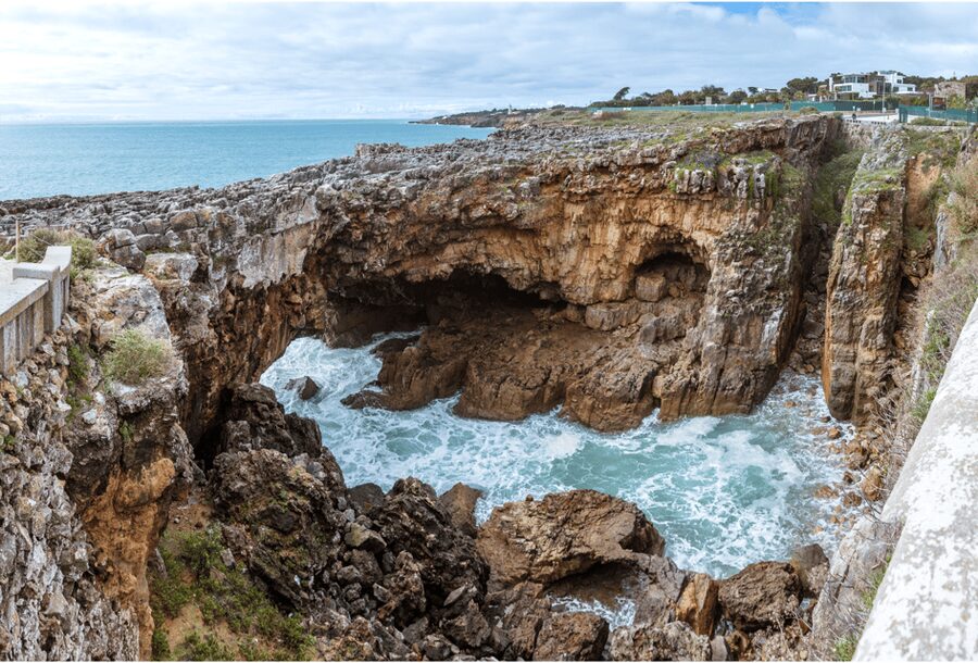 From Lisbon: Sintra, Pena Palace, Regaleira, Cabo da Roca, and Cascais - Pena Palace on the hill, romantic colors and serious views