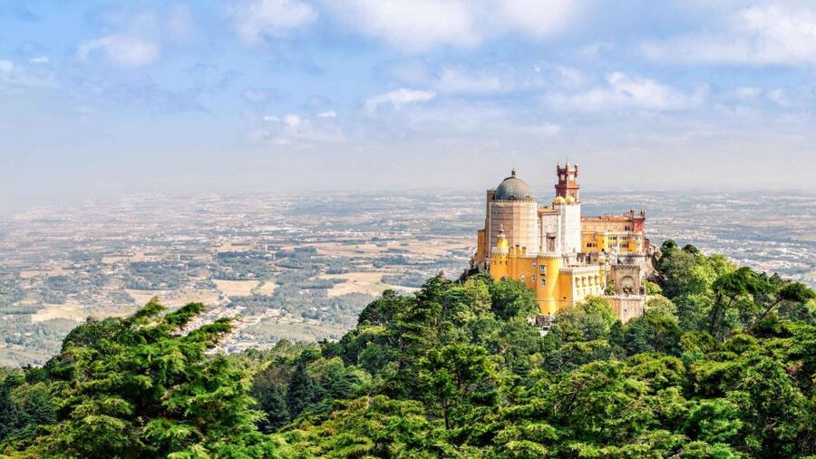 From Lisbon: Sintra, Pena, Regaleira, Coast Roca & Cascais - Guincho Beach and the Roca viewpoint: cliffs, dunes, and that west-coast drama