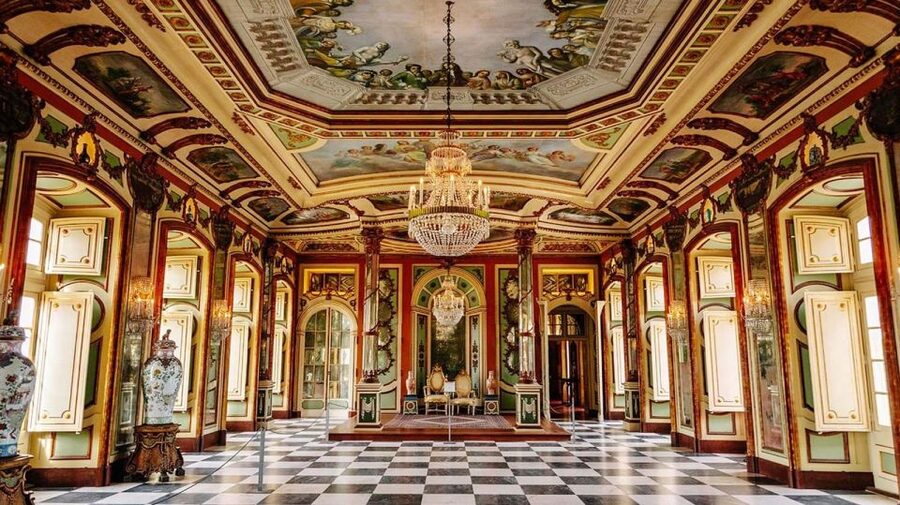 From Lisbon: Sintra Pena Regaleira Roca Cap Cascais Tour - Pena Palace: Why the Colors Look Like a Movie Set