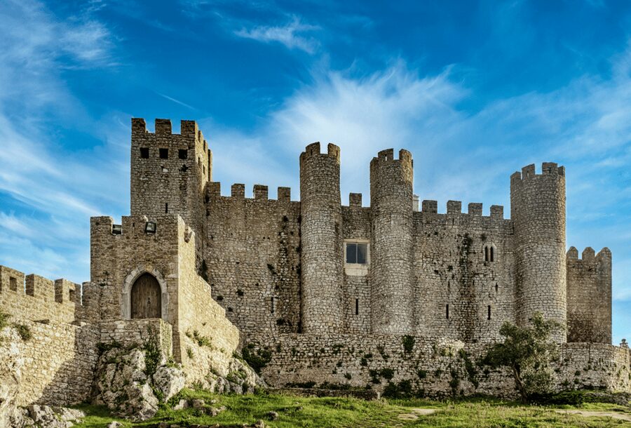 From Lisbon: Tour to Óbidos and Nazaré - Medieval Village, Ginja, and Giant Waves - Entering Óbidos, a walled medieval town with time to actually wander
