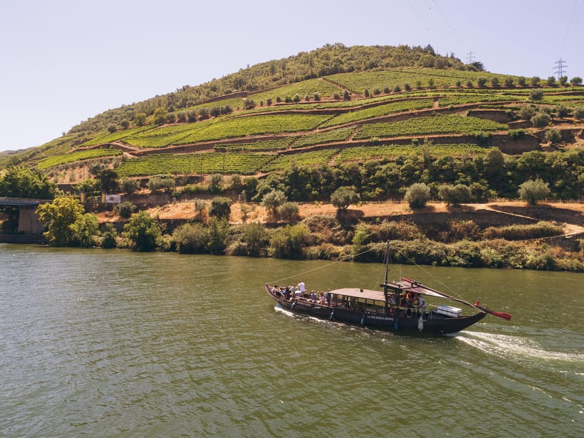 From Pinhão: Douro Valley Rabelo Boat Tour with Port Wine - Approaching the Barragem do Tua: the standout moment