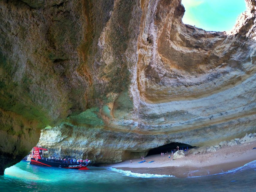 From Portimão: 2-Hour Catamaran Tour to Benagil Caves - Praia da Marinha: your short swim and the famous arches