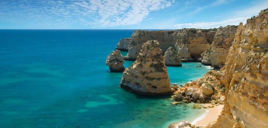 From Portimao: Benagil Cave and Marinha Beach Boat Tour - Boat ride feel: speed, smooth turns, and life jacket confidence