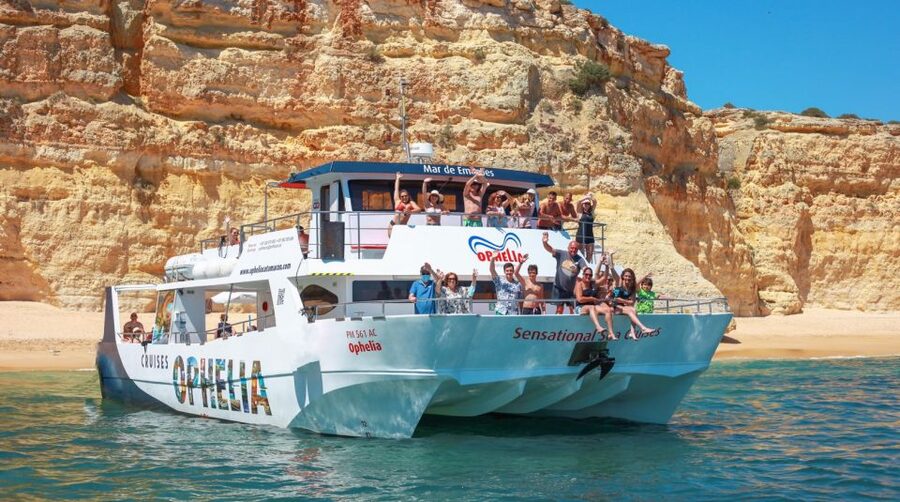 From Portimão: Catamaran Cruise to Benagil Caves with BBQ - Portimão to Ferragudo: castle views before the caves