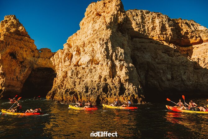 Kayak tour in Lagos to visit the caves. - Rough water, choppy timing, and the tow boat safety net
