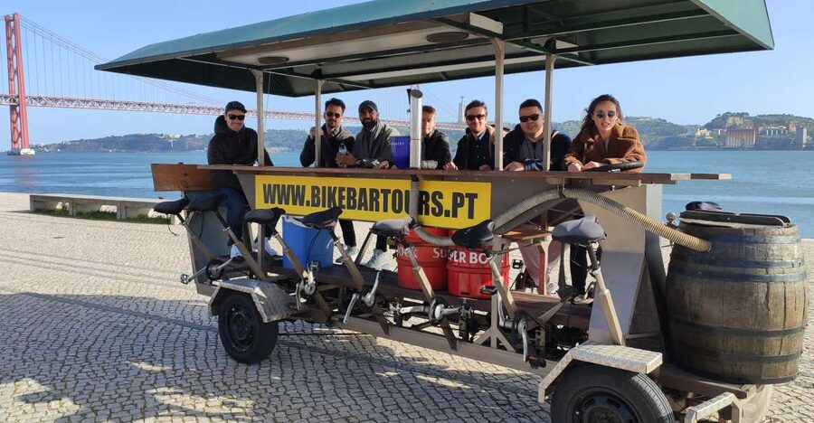 Lisbon: 1-Hour Beer Bike Tour with Draft Beer & Sangria Ride - Getting on board near SUD Lisboa, Farturas Lusitanas, and Cafe In