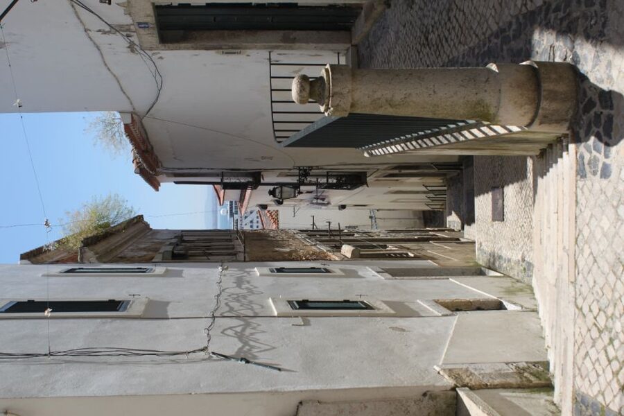 Lisbon: Alfama and São Jorge Castle Quarters Walking Tour - Lisbon Cathedral interior, plus a mix of architectural styles