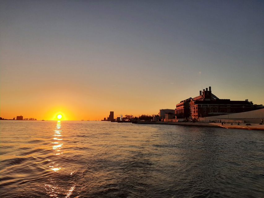 Lisbon: City Skyline Sailboat Cruise with Drink and Snacks - Meeting at Santo Amaro Dock, under the 25th of April Bridge