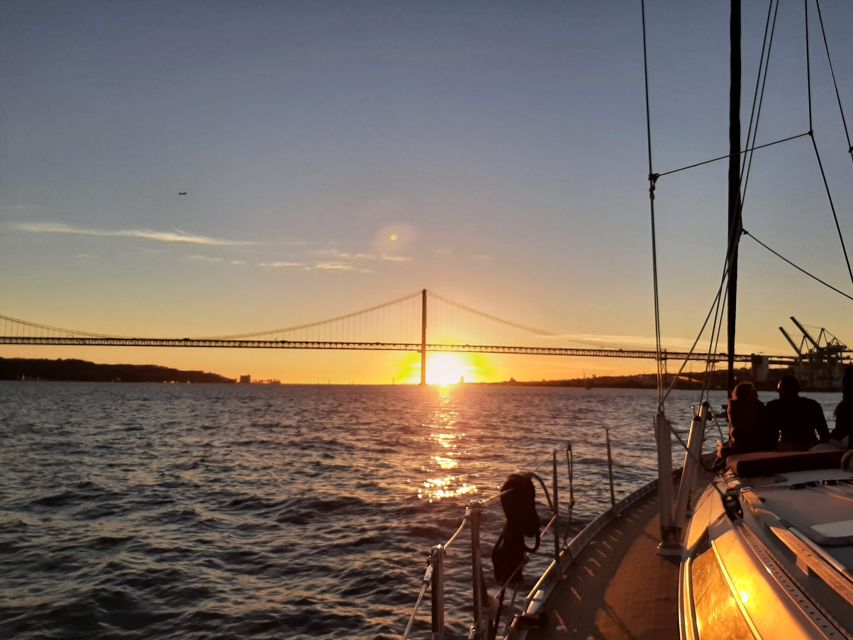 Lisbon: City Skyline Sailboat Cruise with Drink and Snacks - Praça do Comércio and Baixa from the river, where the city looks bigger