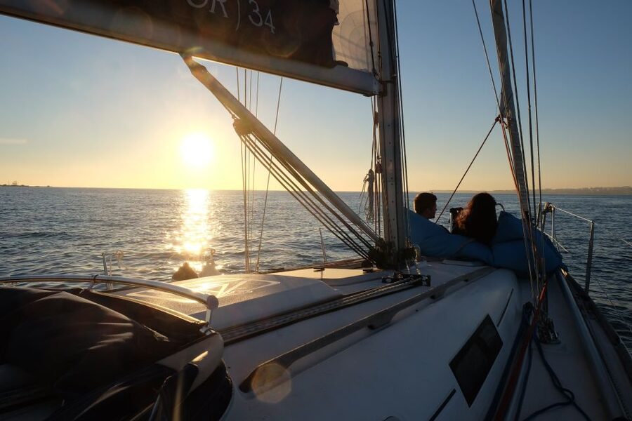 Lisbon: City Skyline Sailboat Cruise with Drink and Snacks - Weather reality: what to wear for wind, sun, and surprise rain