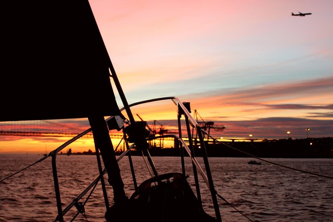 Lisbon: Daylight or Sunset on a Vintage Sailboat - Christ the King viewpoints and the big drama of 25 de Abril Bridge